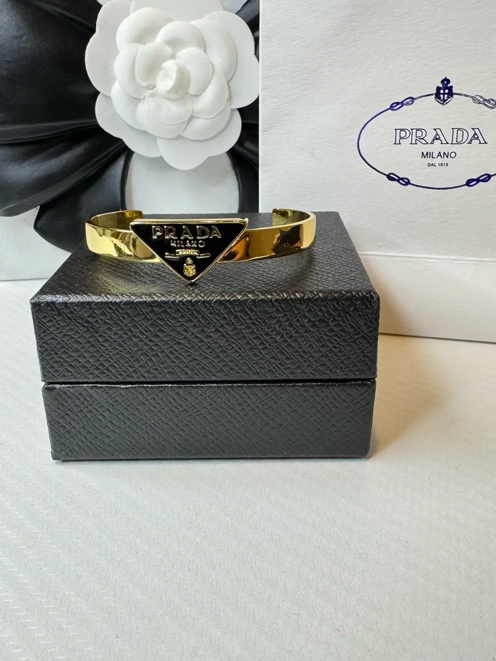 Prada polished gold
